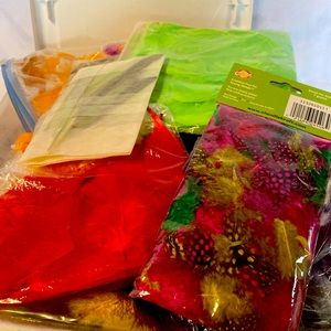 Lot of different types and colors of feathers.